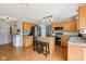 The beautiful kitchen features stainless steel appliances, granite countertops, and a stylish kitchen island with seating at 9099 Merrill Ct, Fishers, IN 46038