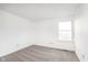 Bright bedroom with neutral carpet and a window for natural light at 9467 Sandpiper W Dr, Indianapolis, IN 46268