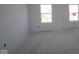 Bedroom with large windows, offering lots of natural light and providing a cozy retreat for relaxation at 10145 Redwood Peak Ln, Indianapolis, IN 46259