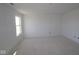 Bright bedroom with a large window, offering natural light and creating a peaceful atmosphere at 10145 Redwood Peak Ln, Indianapolis, IN 46259