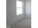 Bright bedroom with a large window, offering natural light and creating a peaceful atmosphere at 10145 Redwood Peak Ln, Indianapolis, IN 46259