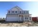Charming two-story home featuring a front-facing garage and covered porch, perfect for a growing Gathering at 10145 Redwood Peak Ln, Indianapolis, IN 46259