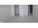 Spacious interior with smooth walls and an open floor plan, ideal for customization and modern living at 10145 Redwood Peak Ln, Indianapolis, IN 46259