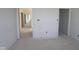 Spacious interior with smooth walls and an open floor plan, ideal for customization and modern living at 10145 Redwood Peak Ln, Indianapolis, IN 46259