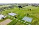 Aerial view of tennis courts, basketball courts, and green space at 1051 Margate Dr, Greenwood, IN 46143