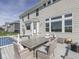 Outdoor deck features dining and lounge furniture at 1051 Margate Dr, Greenwood, IN 46143
