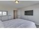 Bright bedroom featuring plank flooring, neutral color palette, and plenty of light at 1051 Margate Dr, Greenwood, IN 46143