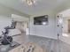 Bonus room with recessed lighting, a tv, and access to other rooms at 1051 Margate Dr, Greenwood, IN 46143