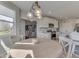 Bright breakfast nook with round table and pendant lighting situated next to the kitchen at 1051 Margate Dr, Greenwood, IN 46143