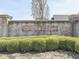 Brighton Estates entrance with brick wall, manicured hedges, and clear signage at 1051 Margate Dr, Greenwood, IN 46143