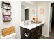 Functional bathroom featuring storage baskets, decor, and a vanity with drawers at 10538 Rose Mill Dr, Lawrence, IN 46235