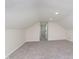 Versatile attic space featuring carpeted floors and neutral walls, ready for customization at 10745 Southeastern Ave, Indianapolis, IN 46239