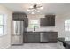 Modern kitchen featuring stainless steel appliances, sleek cabinetry, and updated countertops at 10745 Southeastern Ave, Indianapolis, IN 46239