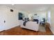 Spacious living room featuring hardwood floors, designer furniture, and a bright, airy ambiance at 10745 Southeastern Ave, Indianapolis, IN 46239