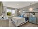 Serene bedroom with large window, a plush bed, and soothing decor at 10805 Soda Creek Ct, Indianapolis, IN 46239