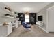Bonus room featuring built-in shelves, desks, and comfortable seating at 10805 Soda Creek Ct, Indianapolis, IN 46239