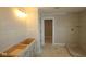 Bathroom with white vanity, tiled walk-in shower and tile floors at 12417 Fresh Stock Dr, Noblesville, IN 46060