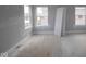 Bedroom with several windows and unfinished flooring at 12417 Fresh Stock Dr, Noblesville, IN 46060
