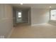 Spacious living room with ample natural light and neutral walls ready for your personal touch at 12417 Fresh Stock Dr, Noblesville, IN 46060