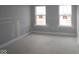 Open living room featuring two large windows for great natural light at 12417 Fresh Stock Dr, Noblesville, IN 46060