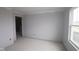 An unfinished room with natural light and neutral tones, awaiting personalization and design at 12417 Fresh Stock Dr, Noblesville, IN 46060