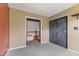 Bedroom with neutral carpet, a built-in closet, and a view into the hallway at 12449 Huntington Dr, Indianapolis, IN 46229