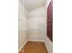 Spacious walk-in closet featuring ample wire shelving and a unique door with hook hardware at 12449 Huntington Dr, Indianapolis, IN 46229