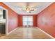 Inviting dining room with wood-look floors and a large window for natural light at 12449 Huntington Dr, Indianapolis, IN 46229