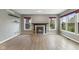 Cozy living room featuring a fireplace, wood floors, and plenty of natural light at 12449 Huntington Dr, Indianapolis, IN 46229