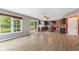 Spacious living room with wood flooring and large windows at 12449 Huntington Dr, Indianapolis, IN 46229