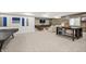 Finished basement with a large entertainment area, modern decor, and ample space for recreation at 1285 Chatham Hills Blvd, Westfield, IN 46074