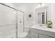 Modern bathroom with a white vanity, shower, and clean finishes at 1285 Chatham Hills Blvd, Westfield, IN 46074