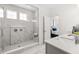 Luxurious bathroom showcasing a marble shower, sleek vanity, and elegant design, offering a spa-like experience at 1285 Chatham Hills Blvd, Westfield, IN 46074