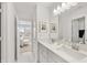 Bright and airy bathroom featuring dual sinks and lots of light, leading into the Primary bedroom at 1285 Chatham Hills Blvd, Westfield, IN 46074