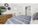 Bright bedroom featuring modern decor and hardwood dresser, with a view to bathroom and living areas at 1285 Chatham Hills Blvd, Westfield, IN 46074