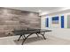 Basement game room featuring a ping pong table and accent wall at 1285 Chatham Hills Blvd, Westfield, IN 46074