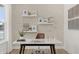 Bright home office space with modern desk, shelves, and decorative elements, creating an inspiring work environment at 1285 Chatham Hills Blvd, Westfield, IN 46074