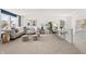 Bright living room with plush sofa, stylish seating, and a charming workstation at 1285 Chatham Hills Blvd, Westfield, IN 46074