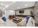 Spacious basement living room with a custom accent wall and comfortable seating at 1285 Chatham Hills Blvd, Westfield, IN 46074