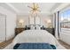 Elegant main bedroom featuring a large bed, stylish furniture, and a modern light fixture, offering comfort and style at 1285 Chatham Hills Blvd, Westfield, IN 46074