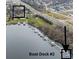 Panoramic aerial view showcases homes near a boat dock by a tranquil lake and highway at 13855 Waterway Blvd, Fishers, IN 46040