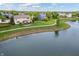 Aerial view of the house and a pond at 14145 Charity Chase Cir, Carmel, IN 46074