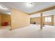 Large basement area with neutral paint and open space, great for entertaining at 14145 Charity Chase Cir, Carmel, IN 46074