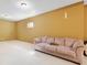 Rec Room area in finished basement with carpet, window, and peach-colored walls at 14145 Charity Chase Cir, Carmel, IN 46074