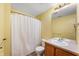 Clean bathroom with shower-tub combination, single sink vanity, and neutral tones at 14145 Charity Chase Cir, Carmel, IN 46074