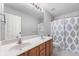 Standard full bathroom featuring double sinks, vanity, and a shower-tub combo at 14145 Charity Chase Cir, Carmel, IN 46074