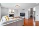 Comfortable living room with cozy fireplace, open floor plan, and ample natural light at 14145 Charity Chase Cir, Carmel, IN 46074