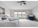 Bright main bedroom featuring carpet, many windows, and a comfortable bed at 14145 Charity Chase Cir, Carmel, IN 46074