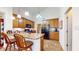 Eat-in kitchen with a breakfast bar, lots of cabinets, and a view into other rooms at 1435 Colony Park Dr, Greenwood, IN 46143