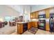 Well-lit kitchen with modern appliances and a breakfast bar perfect for casual dining at 1435 Colony Park Dr, Greenwood, IN 46143